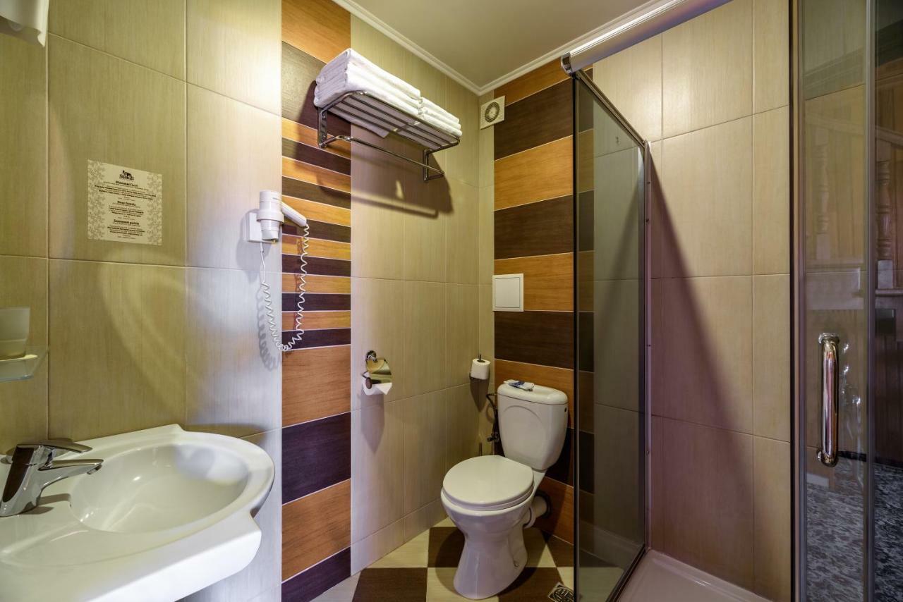 Status Hotel Malekhuv Buitenkant foto